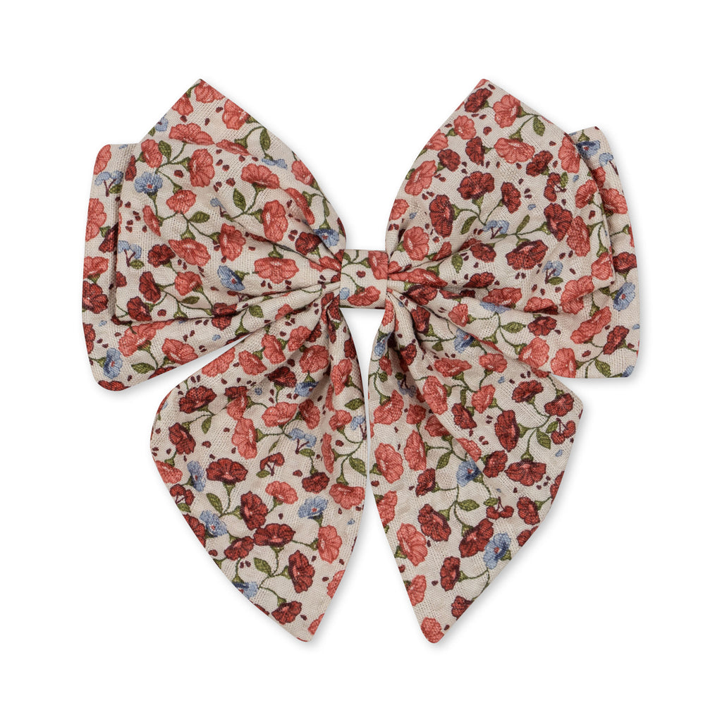 A floral printed hair clip made in organic cotton perfect for adding a touch of elegance to any hairstyle