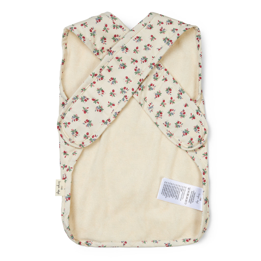 Organic cotton coated bibs featuring a flower print